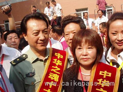 张继钢与周海仙校长合影